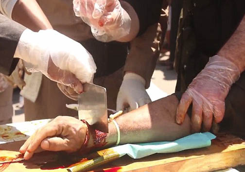 قطع دست و پا با ساطور داعشی/عکس